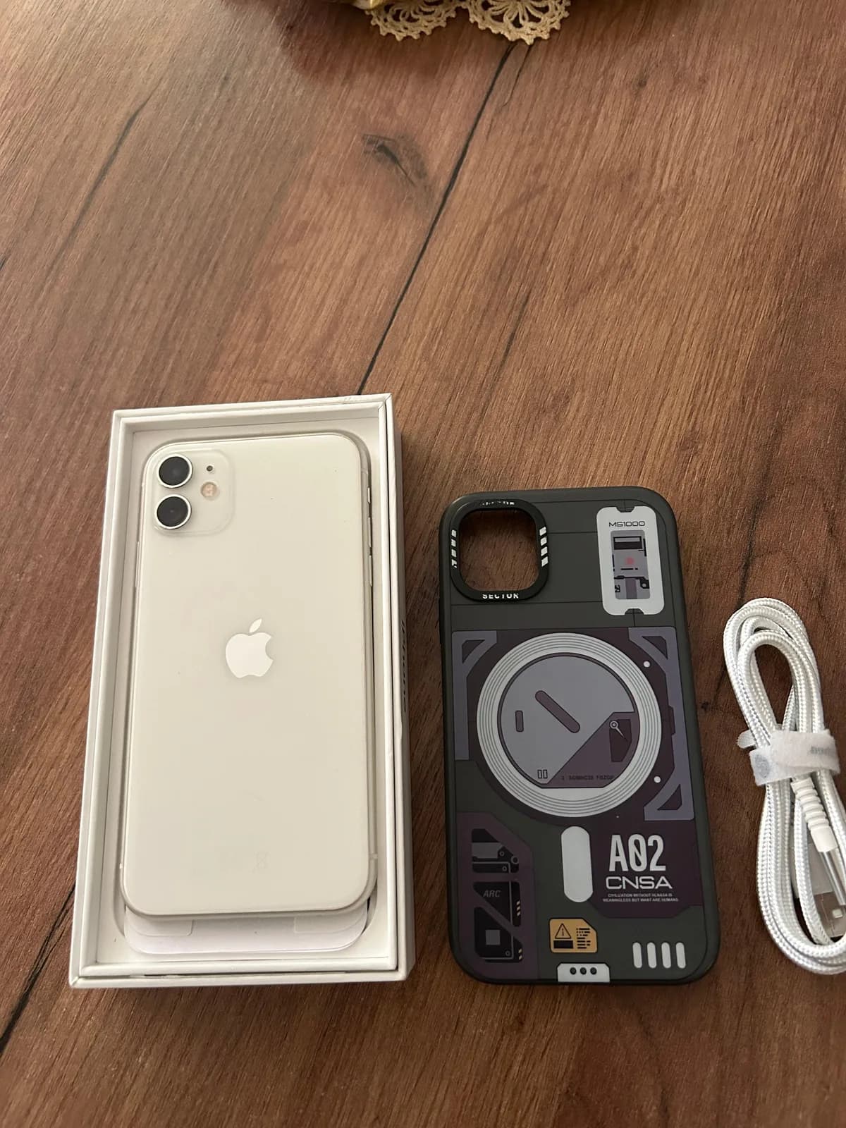 iPhone 11, 64 GB — foto 1 nga 7